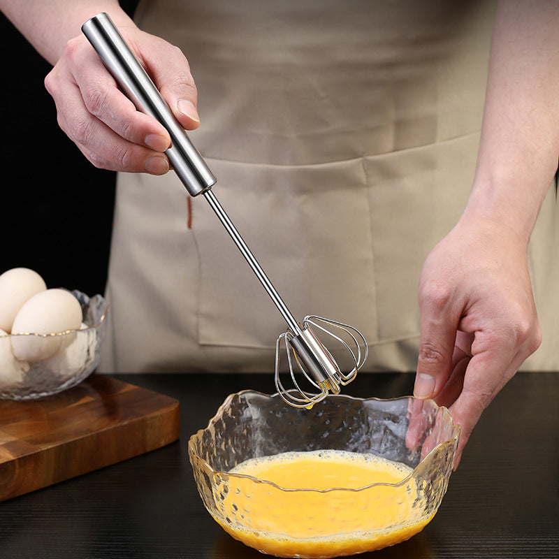 Stainless Steel Semi-automatic Egg Beater in use